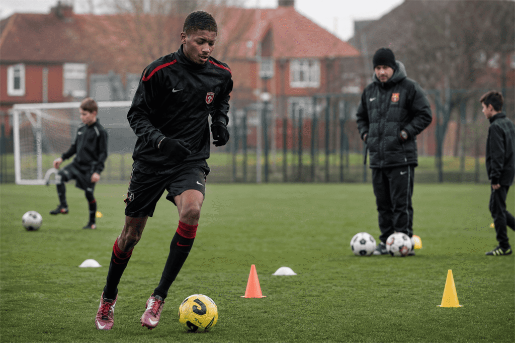 Young Marcus Rashford training during his early football development in Manchester
