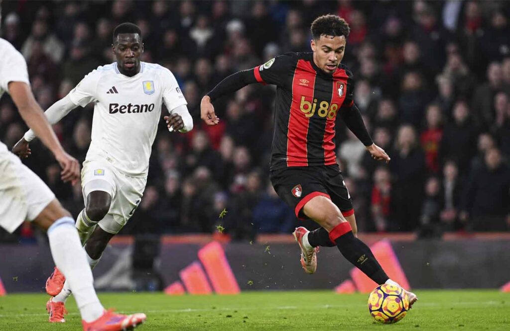 Junior Kroupi of Bournemouth dribbles forward among young football strikers 2026