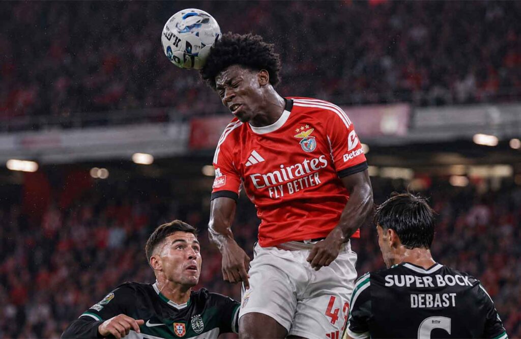 Anisio Cabral wins a header for Benfica against Sporting CP, one of 2026's young football strikers