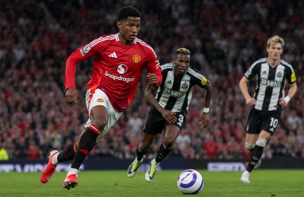 Chido Obi drives forward with the ball for Manchester United during a match against Newcastle United