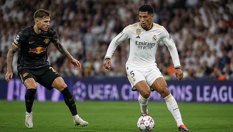 Jude Bellingham wearing the Real Madrid white jersey during a UEFA Champions League football match