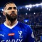 Karim Benzema Biography – French football striker Karim Benzema portrait in professional football kit